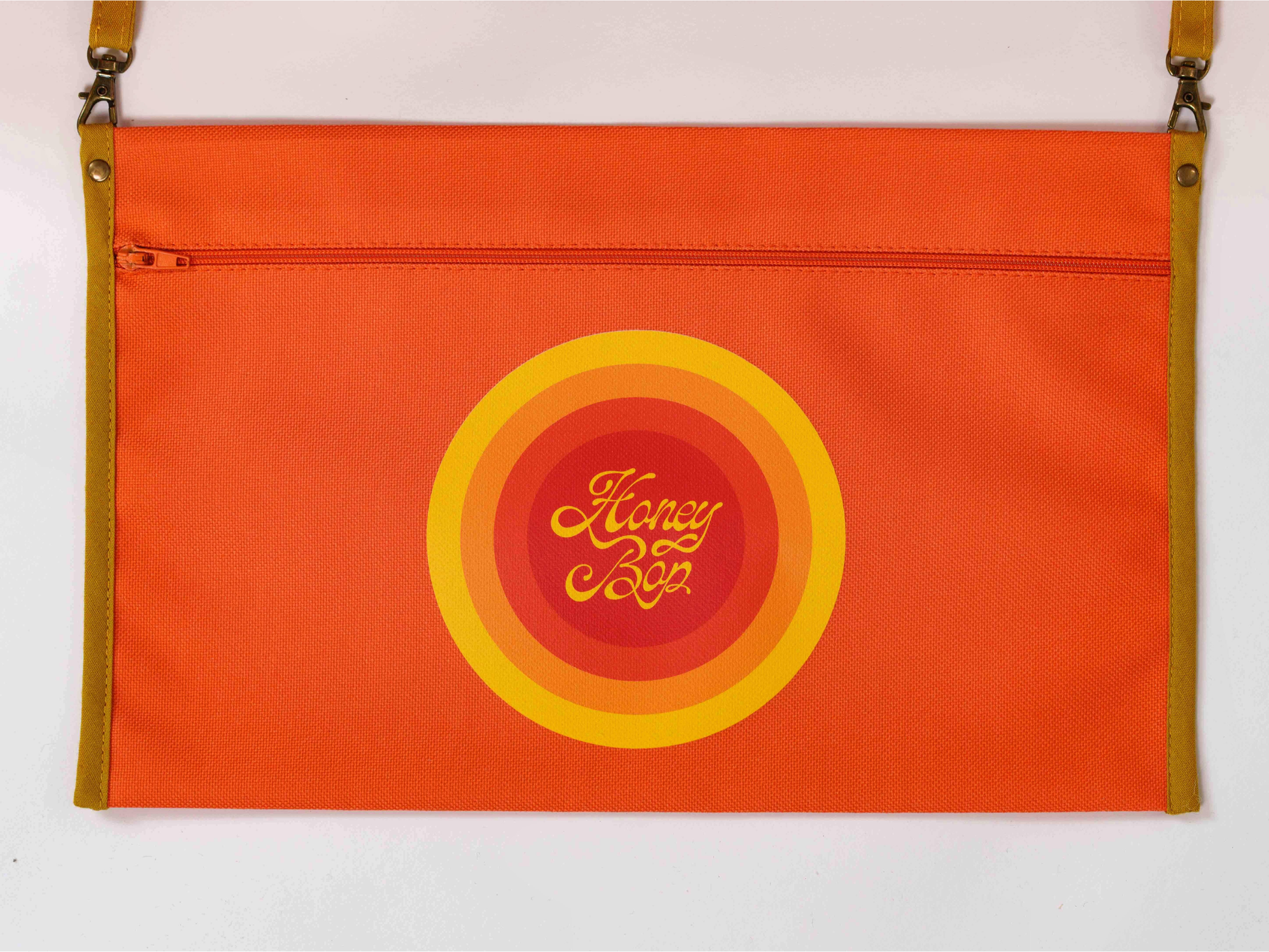 Pochette imperméableamovible du matelas de plage Daisy ’73 orange avec fermeture zippée et logo Honey Bop