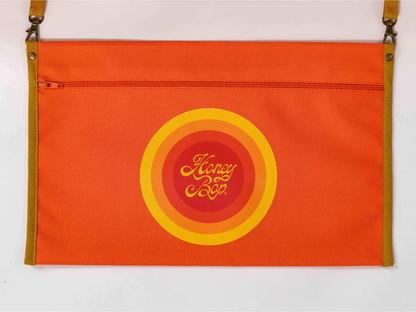 Pochette imperméableamovible du matelas de plage Daisy ’73 orange avec fermeture zippée et logo Honey Bop