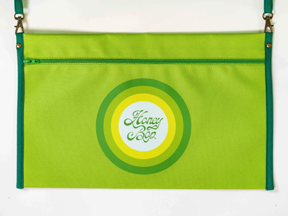 Pochette amovible du matelas de plage Oliva ’71 vert anis avec fermeture zippée et logo Honey Bop